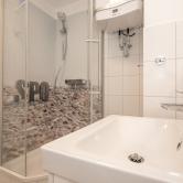 Duschen mit Muscheln 